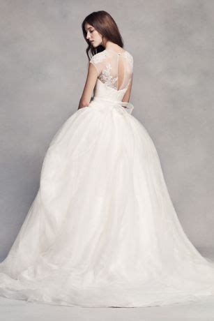 When people hear the name vera wang, they think high fashion, unrivaled class and elegance, and perpetual beauty. White by Vera Wang Lace Illusion Wedding Dress | David's ...