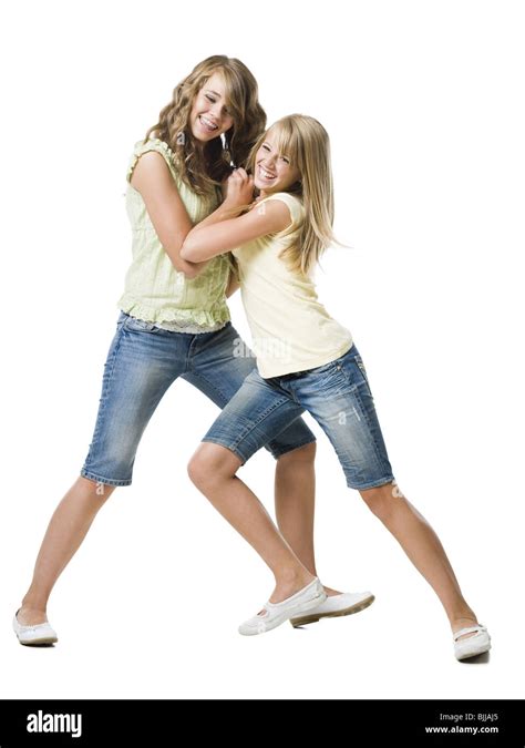 Two Girls Play Fighting And Smiling Stock Photo Alamy