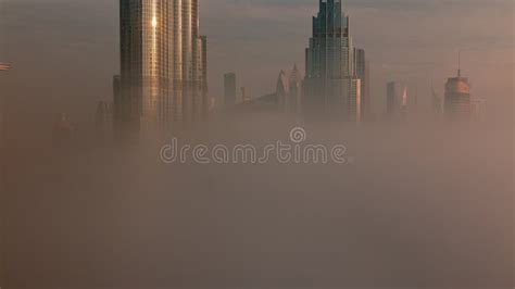 Aerial View Of Dubai City Early Morning During Fog Timelapse Stock