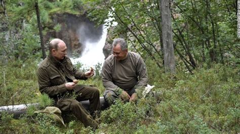 Putins Vacation Photos Boating Tanning Mushroom Picking