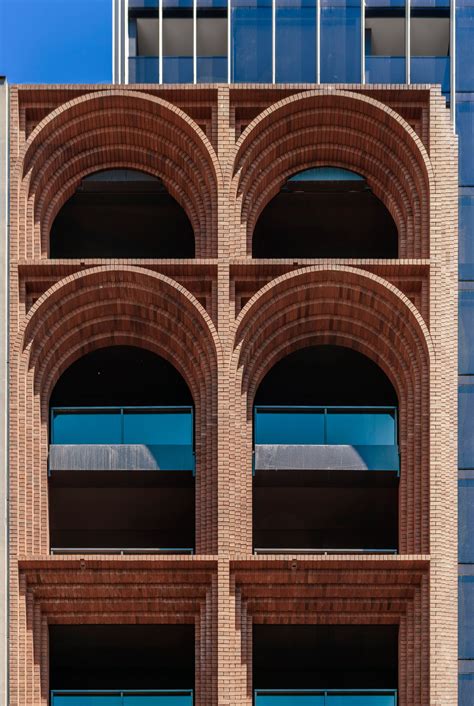 Brick Arches Are Topped By Glass Tower At Arc By Koichi Takada