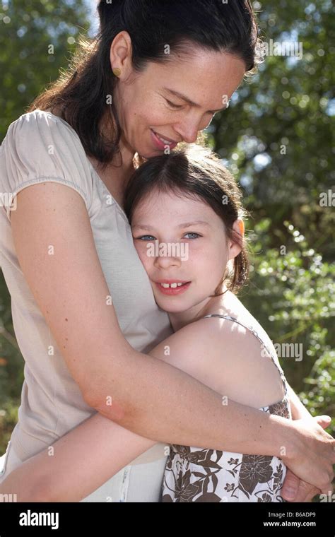 Mother And Daughter Embracing Stock Photo Alamy