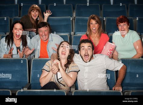 Group Of Seven Scared People Screaming In A Theater Stock Photo Alamy