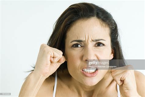 Woman Making Angry Face Holding Up Fists Portrait High Res Stock Photo