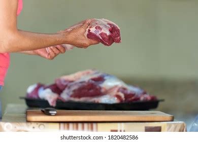 Womans Hands Cutting Beef Preparing Meat Stock Photo