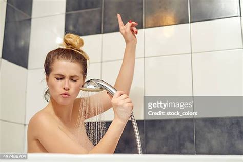 Woman Lathering In Shower Photos And Premium High Res Pictures Getty