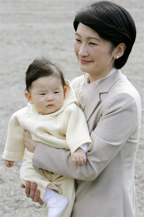 Japan's prince hisahito, the son of crown prince akishino and crown princess kiko, strolling around the paddy fields in punakha, bhutan. Prince Hisahito, carried by his mother Princess Kiko ...