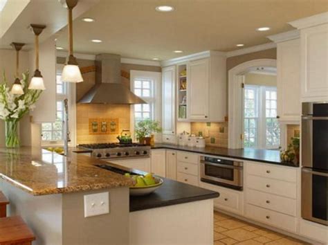 Devoting one wall to cabinets and appliances opens up the rest of the. L Shape 10x10 Kitchen Design L-shaped-10x10- | Budget ...