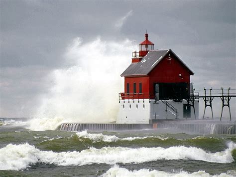 Big Waves Hitting Lighthouse Hd Wallpaper Wallpaper Flare
