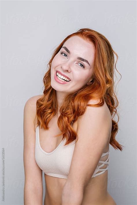 Happy Redhead Woman Studio Portrait By Stocksy Contributor Aleksandra Jankovic Studio