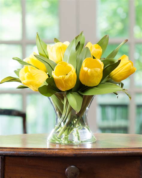 Avoid contact with light coloured fabrics, carpets and other surfaces. Silk Tulip Nosegay Arrangements at Petals