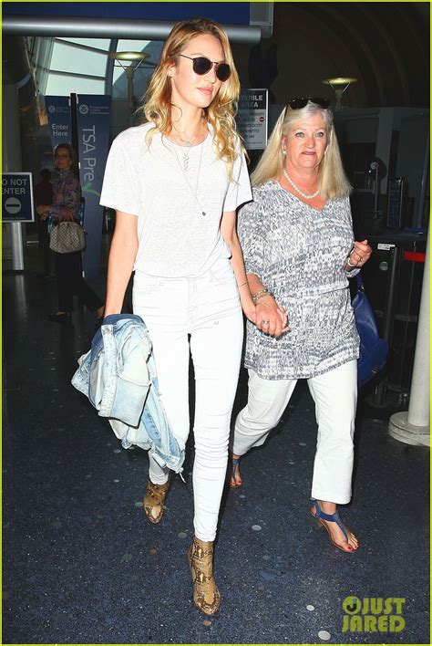 A Candice Swanepoel And Mom Eileen Hold Hands At Lax Airport Photo