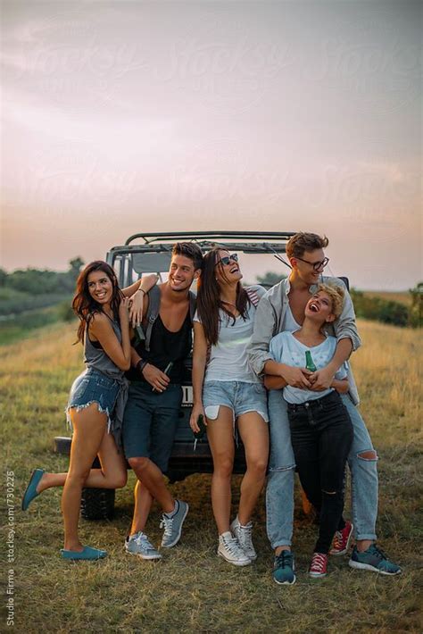 Group Of Friends Laughing And Hanging Around The Truck Friends Group