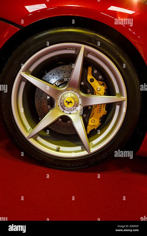 5 Spoke Ferrari Supercar Wheel With Badge And Yellow Brake Caliper