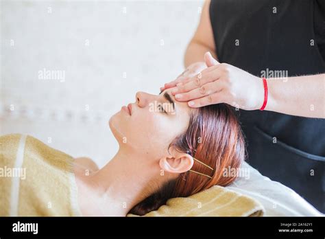 Young Woman Receiving Facial Beauty Treatment In A Spa Stock Photo Alamy