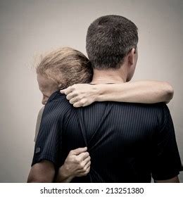 Sad Woman Hugging Her Husband Stock Photo Shutterstock