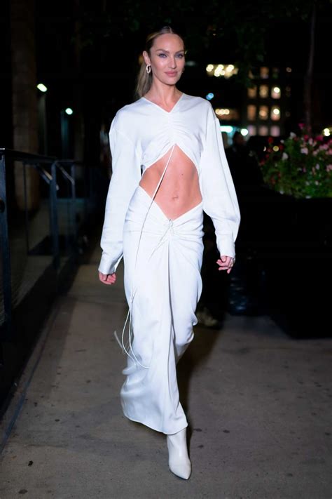 Candice Swanepoel Looks Incredible In A White Midriff Baring Dress As She Steps Out In Tribeca