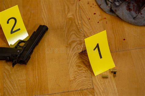 Bullets Bloody Clothes And Gun At Crime Scene Stock Photo Image Of