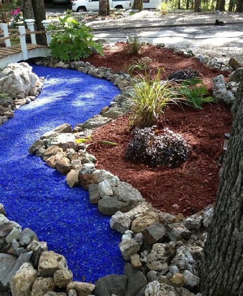 This idea allows you to accentuate the edges of the path to give it more dimension and feel. Glass Mulch Landscaping Ideas That Will Impress You