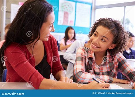 Kids Students In Classroom Helping Each Other Royalty Free Stock Image