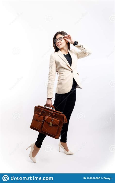 Cute Female White Collar With Leather Satchel Turning Around Stock