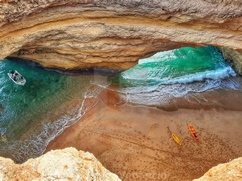 Natural Sea Cave The Benagil In Lagoa Algarve Portugal License
