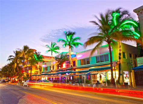 Moving Traffic Illuminated Hotels And Restaurants At Sunset On Ocean Drive Editorial Photo