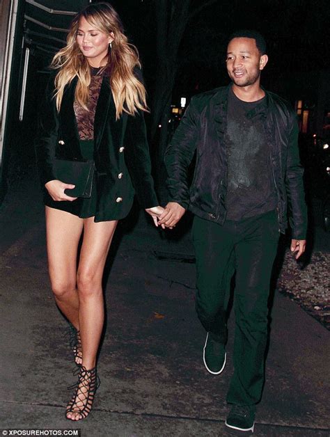 Chrissy Teigen Goes Braless In Sheer Lace Top And High Waisted Hotpants