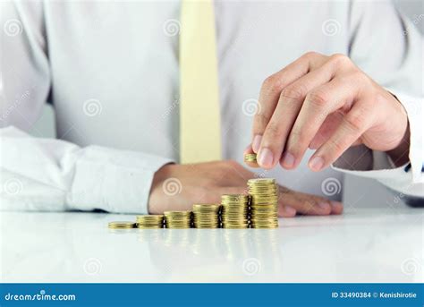 Businessman With Gold Coins Stock Photo Image Of Growth Hand 33490384