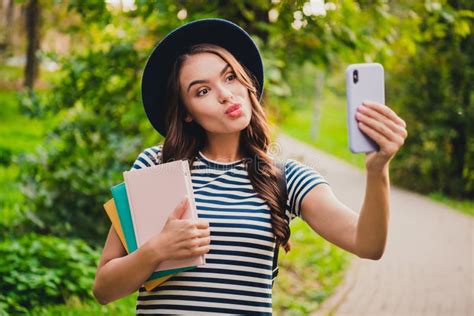 Portrait Of Attractive Flirty Girl Holding Book Taking Making Selfie Video Call Pastime Sending