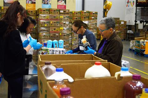 Assemble senior food boxes, help with food distribution. Why volunteers matter - Ozarks Food Harvest