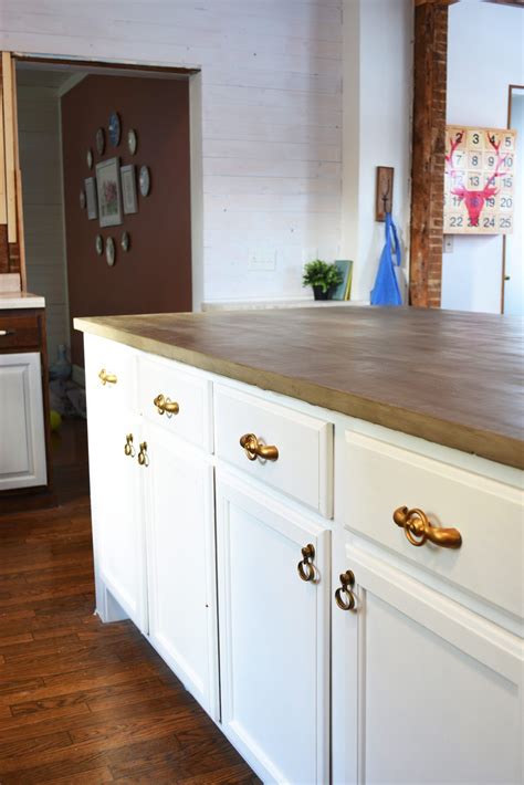 It actually isn't all that difficult to install laminate countertops yourself. my Do It Yourself Kitchen Island with concrete countertops ⋆ NellieBellie | Cheap kitchen ...