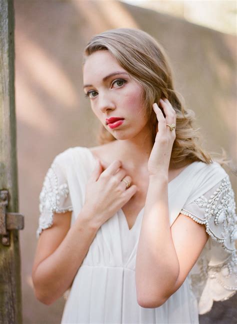 Floral Arbor Ceremony Decor by Megan Sorel Photography | Wedding Sparrow