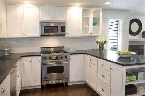 Choosing the right types of kitchen countertops amaza design. white kitchen cabinets and dark countertops - Google ...
