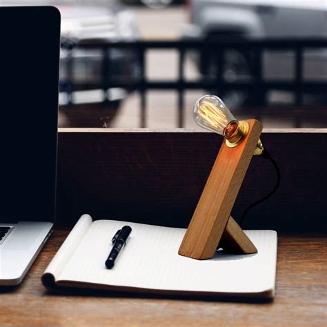 Constructed from aluminum and featuring a strong powder coating, this product requires minimal maintenance. Minimalist Edison Table Lamp By Unique's Co. | notonthehighstreet.com