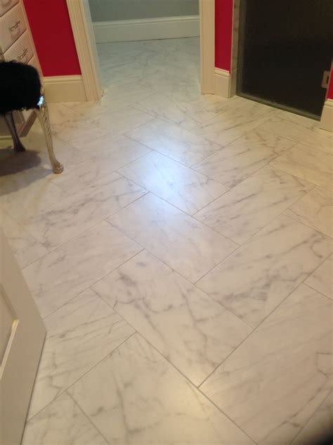 12 x 24 Carrara look porcelain tile in herringbone pattern ...