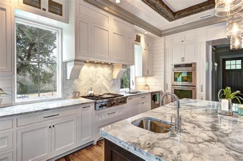 The pros and cons of using marble in the kitchen are often confused and misinterpreted, therefore the aria stone gallery team is here to provide the. White Kitchen with Carrera Marble Island, Countertops and ...