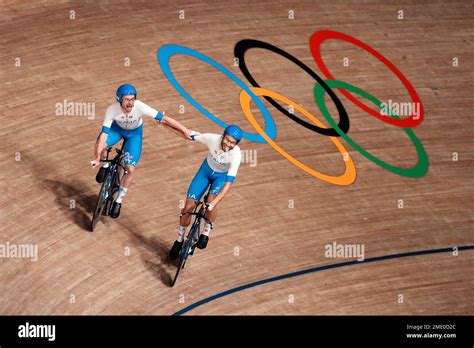 Simone Consonni Left And Filippo Ganna Of Team Italy Celebrate After