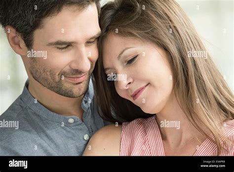 Couple Embracing Portrait Stock Photo Alamy
