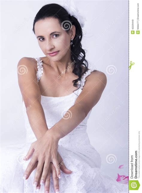 It is getting kind of long now and i sometimes put it up in a type of comb and it can look pretty nice. Attractive Bride Curly Hair White Wedding Gown Stock Image ...