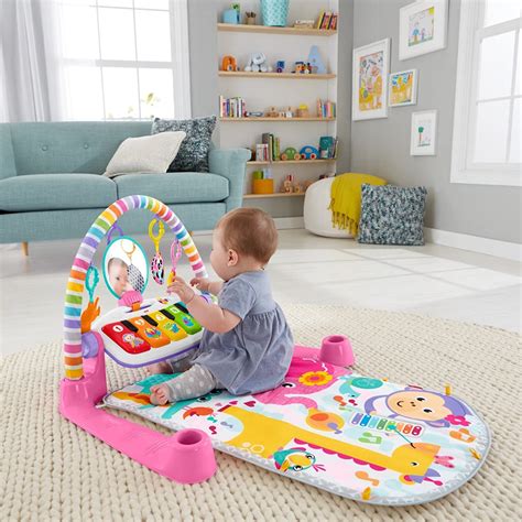 9 twinkling stars, soothing music and animal friends power/volume switch • slide the switch to: Fisher Price Deluxe Kick & Play Piano Activity Gym ...