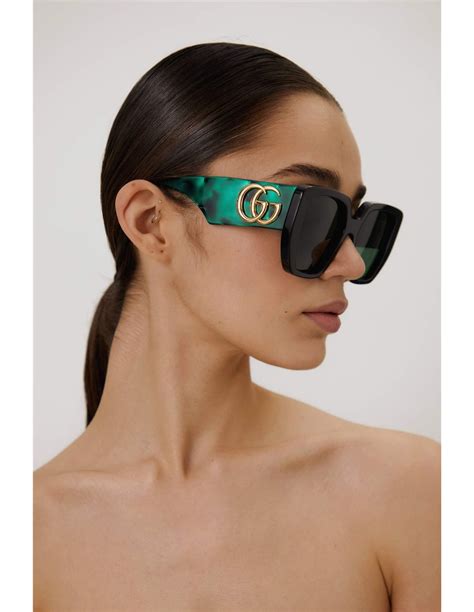 gucci gg0956s oversized black and green sunglasses with maxi logo