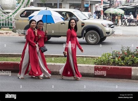 Three Vietnamese Ladies Taking A Walk In Ho Chi Minh City Saigon