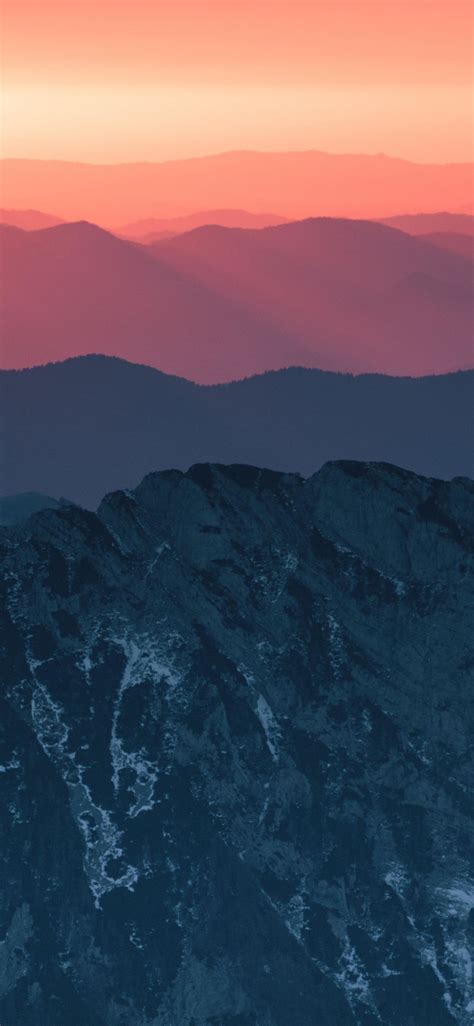1125x2436 Calm Horizon Sunset Mountains Wallpaper Mountains