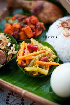 Photo about nasi lemak style dish fresh vegetables nuts and fish with rice popular across indonesia and malyasia. Nasi Berkat | Asian food photography, Food, Asian recipes