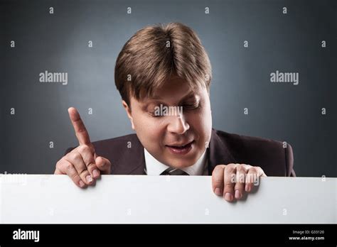 Businessman With Index Finger Up Stock Photo Alamy