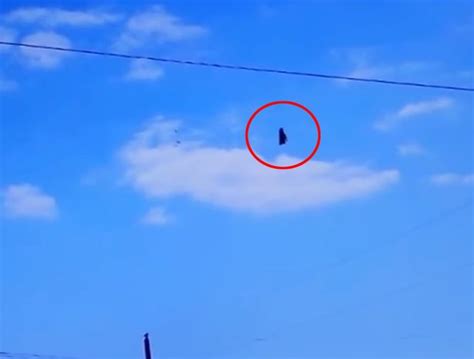 Watch Black Knight Satellite Ufo Filmed Hovering In The Sky Over Town