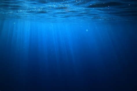Premium Photo Ocean Underwater Rays Of Light Background Under Blue