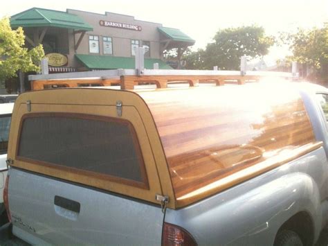 Fitting most medium size trucks the canopy camper has a full vertical rear door allowing easy entry into the camper. Image result for cedar strip truck shell | Truck toppers ...