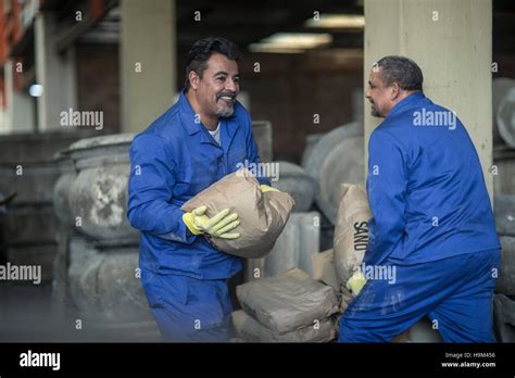Men Carrying Sacks Hi Res Stock Photography And Images Alamy